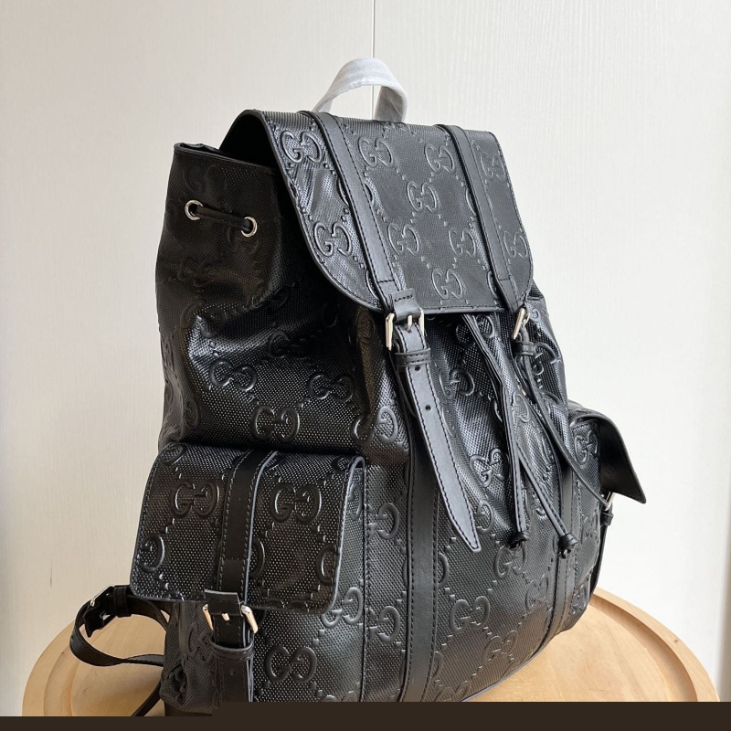 G*u*i backpacks